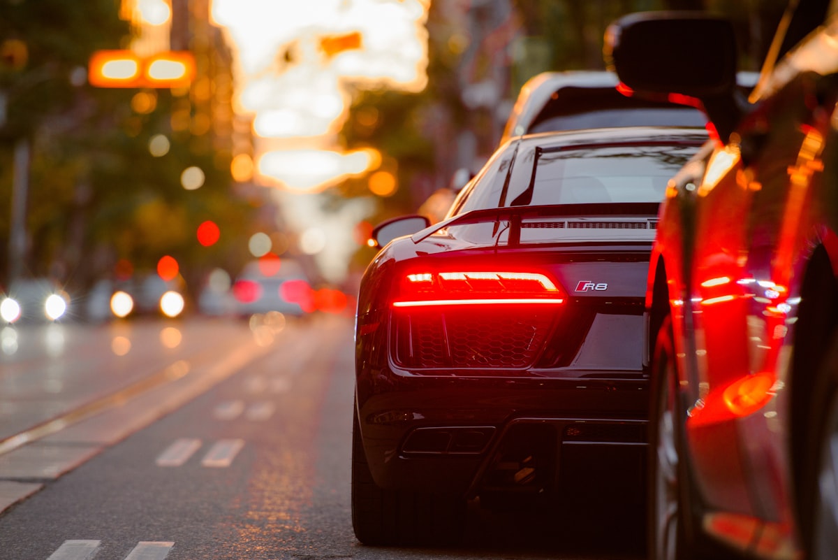Car driving on city road during evening light